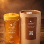 عسل موالح بالشمع الطبيعي في عبوة مميزة